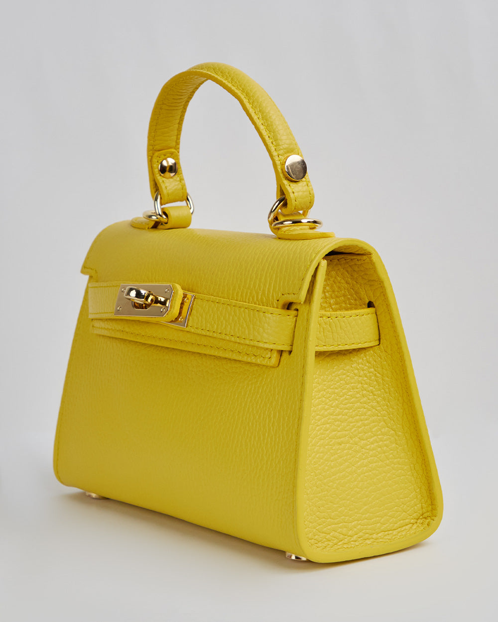 Yellow Hand Case With Gold Handle And Buckle