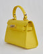 Yellow Hand Case With Gold Handle And Buckle