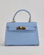 Light Blue Handbag With Handle And Gold Buckle