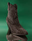 Black suede cowboy boot