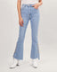 Light blue flared jeans with gold buttons at the bottom