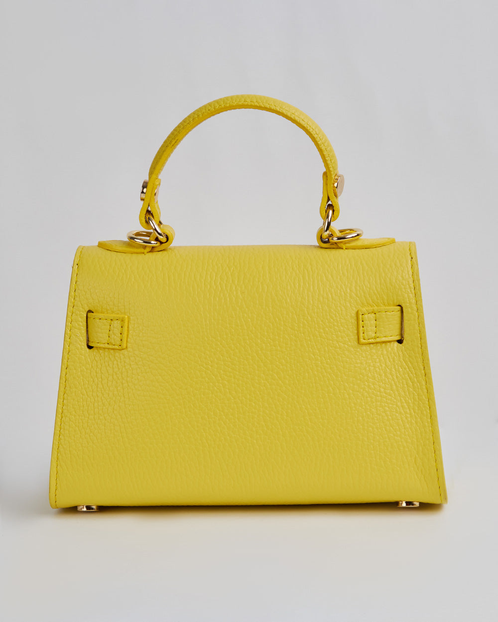 Yellow Hand Case With Gold Handle And Buckle