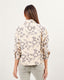 Beige linen jacket with blue brocade and gold buttons