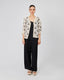 Cream Blouse With Black Pattern