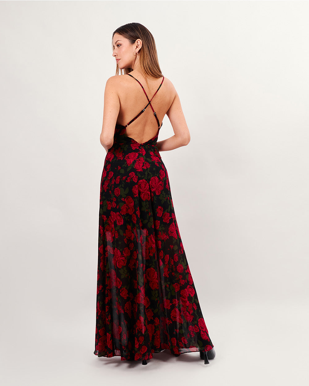 Black long dress with red roses draped neck and crossed back straps