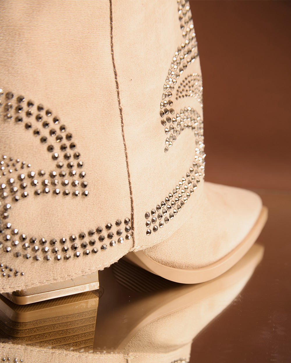 Beige suede cowboy boots