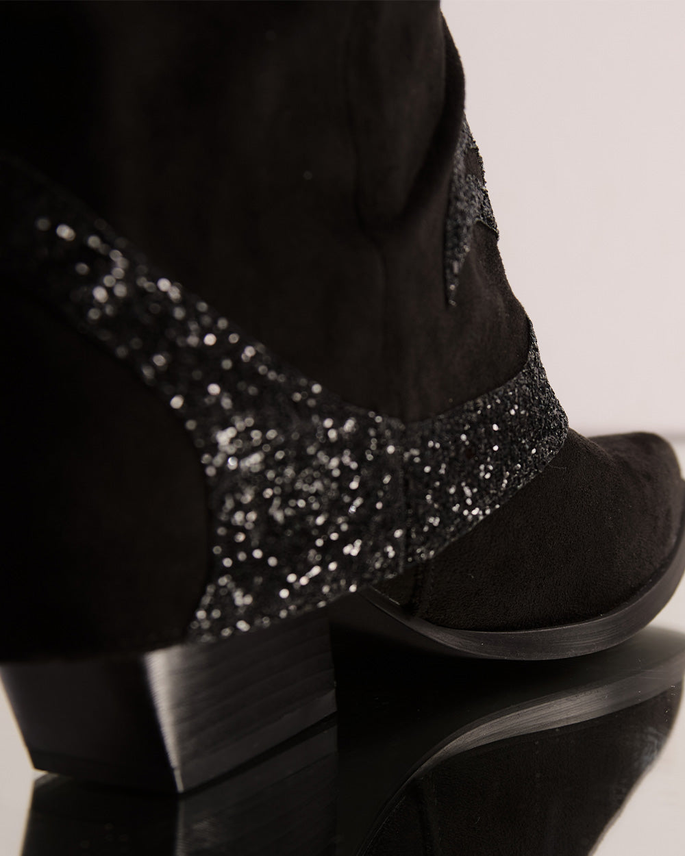 Black suede cowboy boots