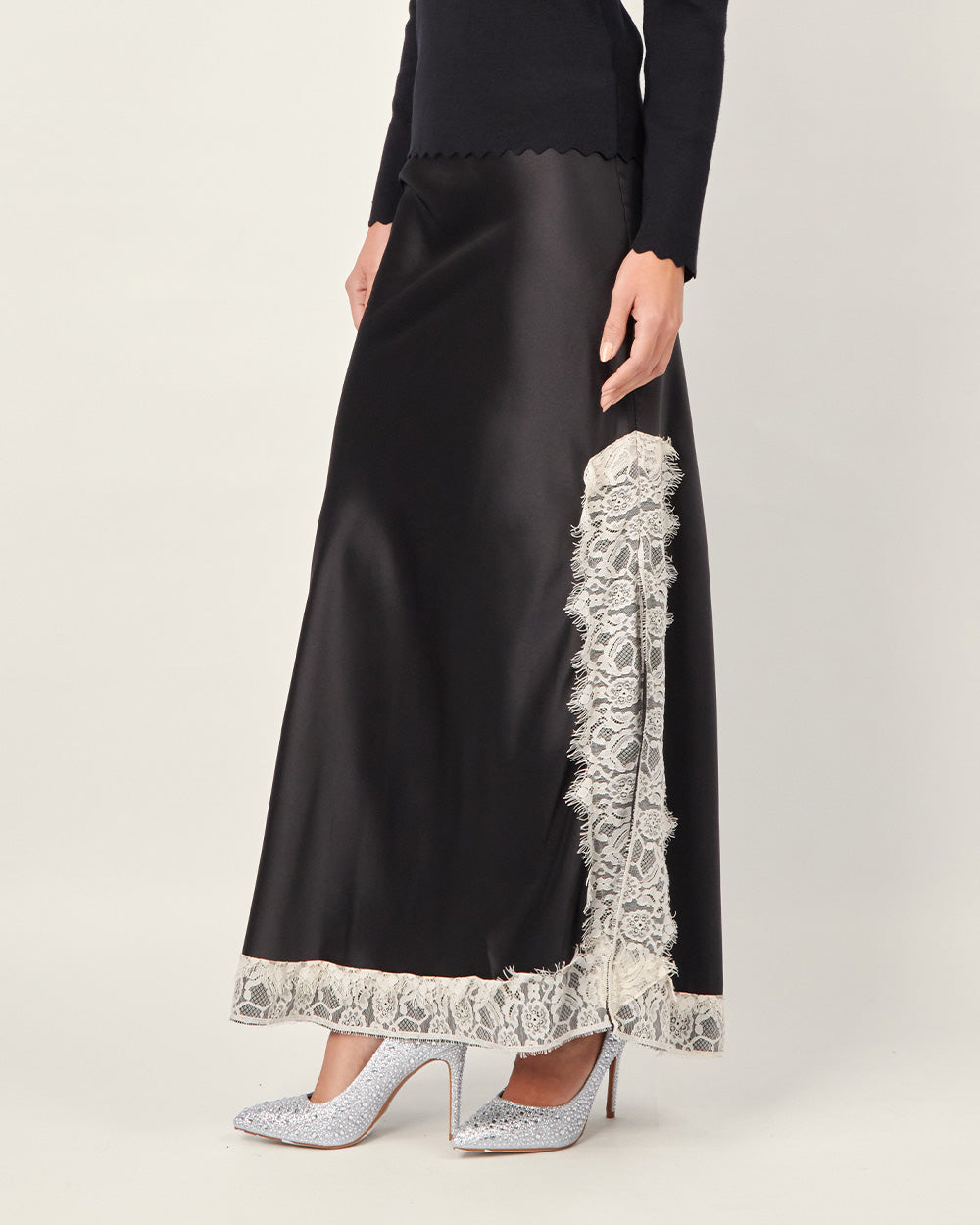 Black silk skirt with lace hem