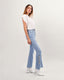 Light blue flared jeans with gold buttons at the bottom