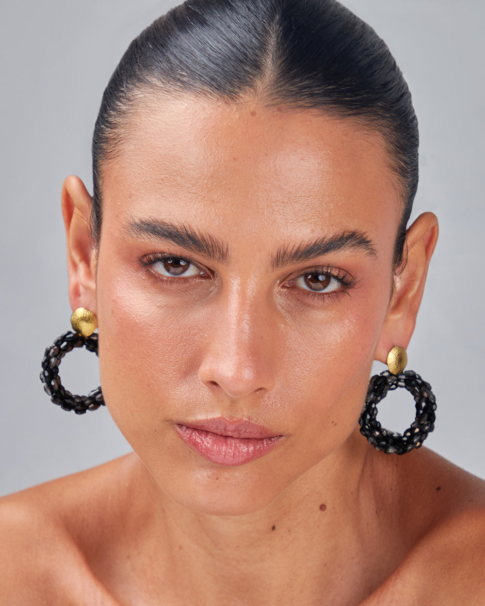 Gold Dangle Earrings With Black Stones