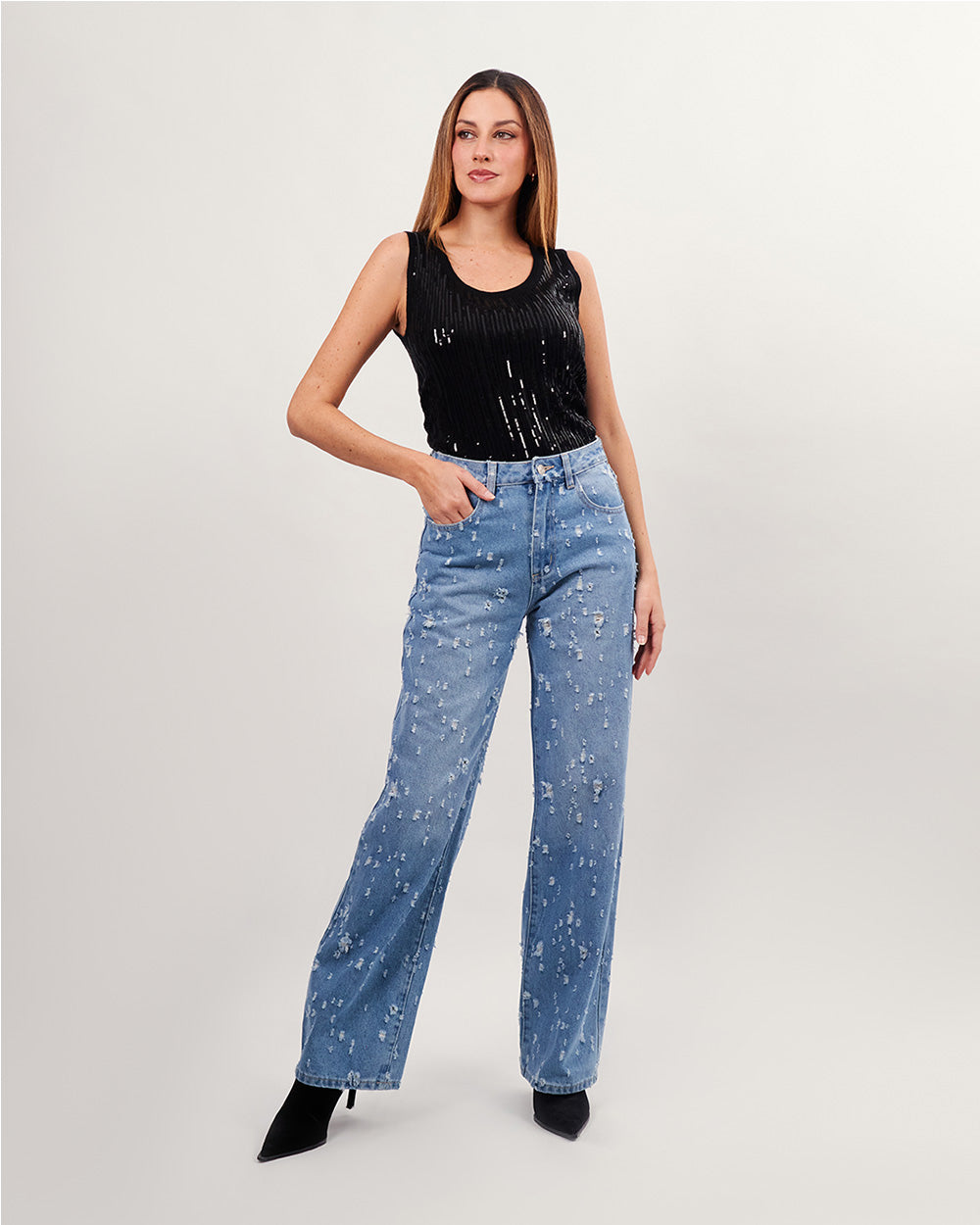 Vaqueros azules rotos